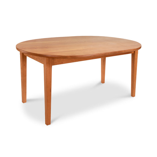 Maple Corner Woodworks Vermont Shaker Oval Solid Top Dining Table with solid wood top and four straight legs, crafted in American hardwood.
