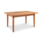 A handcrafted Maple Corner Woodworks Vermont Shaker Rectangular Extension dining table made of solid wood.