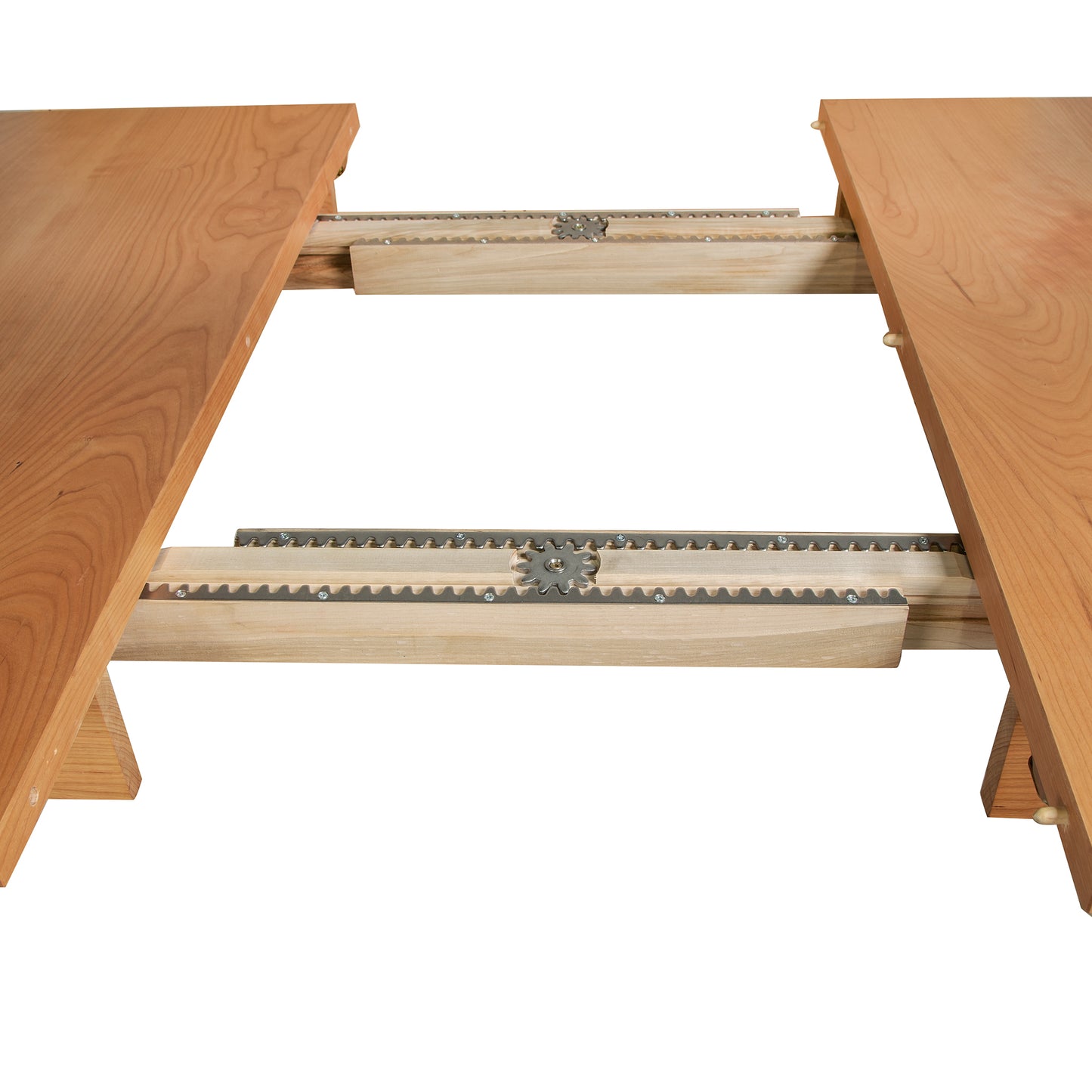 Close-up view of the extendable mechanism of a Maple Corner Woodworks Vermont Shaker Rectangular Extension Dining Table, showing wooden planks and a metallic cog and gear system on a neutral background.