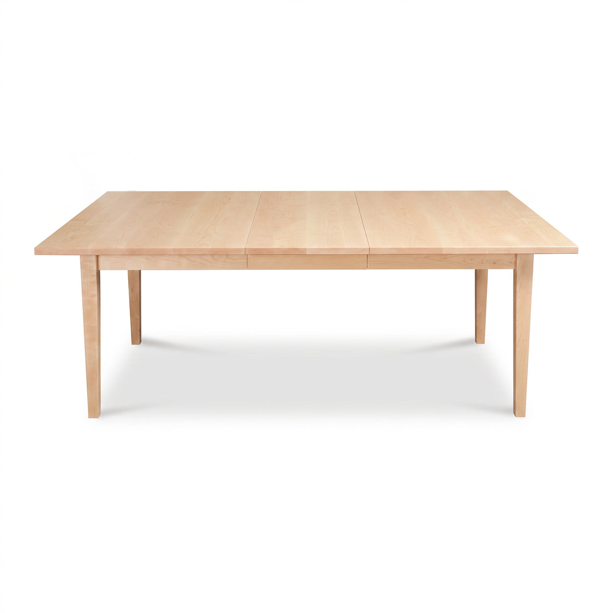Vermont Shaker Rectangular Extension Dining Table by Maple Corner Woodworks with center seam and four legs, crafted in solid wood.