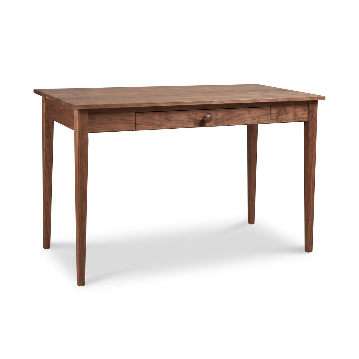 Vermont Shaker Writing Desk by Maple Corner Woodworks featuring four tapered legs and a center drawer, crafted in solid wood.
