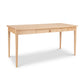 Vermont Shaker Writing Desk by Maple Corner Woodworks, with tapered legs, center drawer, and sustainable solid wood craftsmanship.