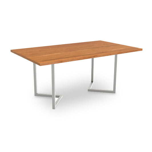 The Lyndon Furniture Vershire Solid Top Dining Table combines a modern-industrial design, featuring sleek metal legs and a beautifully crafted wooden top. This unique piece is handmade to order, ensuring quality craftsmanship and
