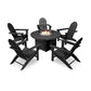 A modern outdoor furniture set featuring four black POLYWOOD Vineyard Adirondack chairs arranged around a circular fire pit table, on a white background.