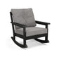 A modern POLYWOOD Vineyard Deep Seating Rocking Chair with a black POLYWOOD frame and gray cushions, displayed on a white background. The chair features plush seating and a simple, sturdy design.