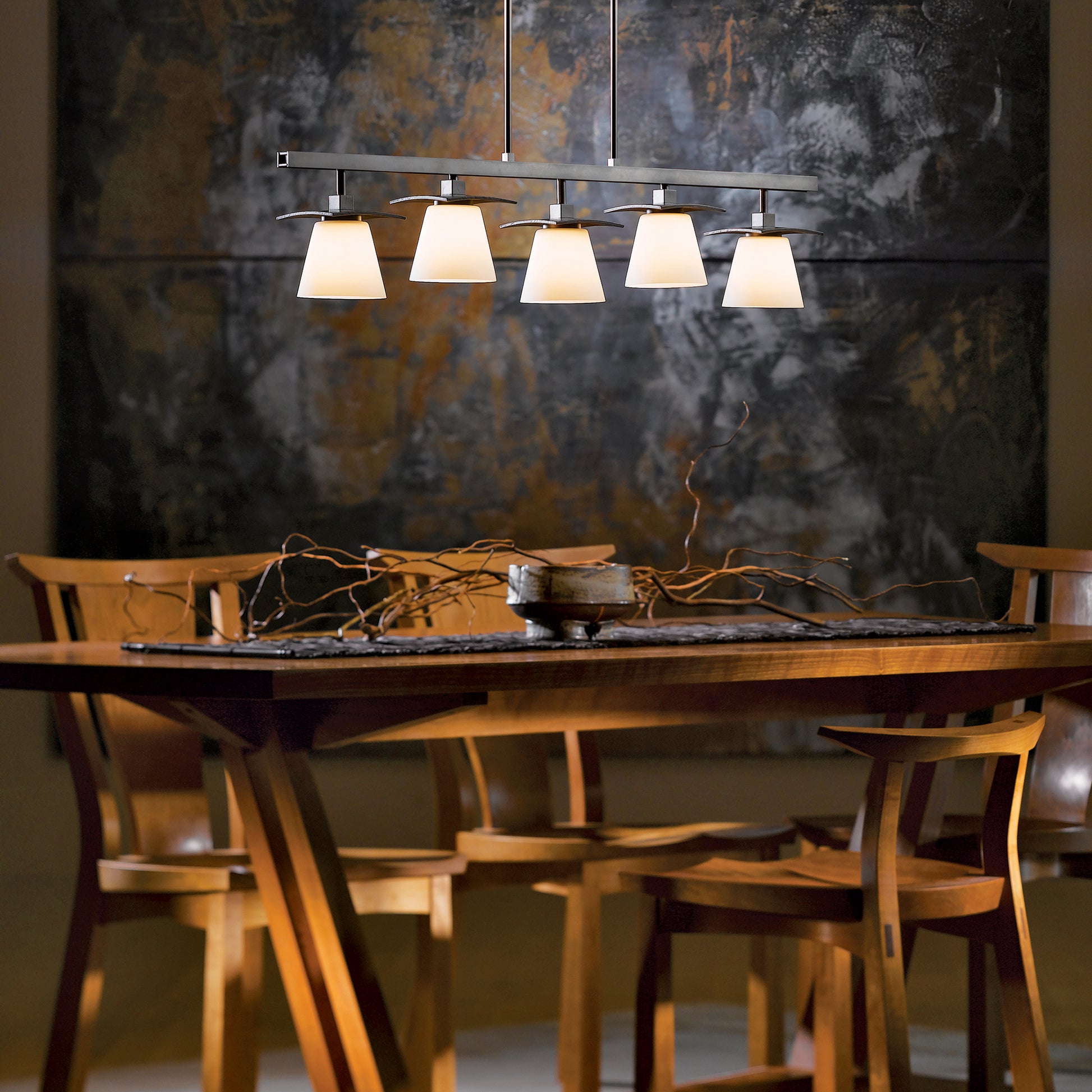 Enhance your dining experience with the exquisite Hubbardton Forge Wren 5-Light Pendant, handcrafted in Vermont by renowned artisans at Hubbardton Forge lighting. This stunning piece will elevate your dining room ambiance.