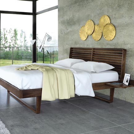 A modern bedroom with a wooden bed.