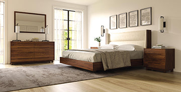 Modern wooden bedroom furniture set featuring a sleek bed, matching dresser, and nightstand.