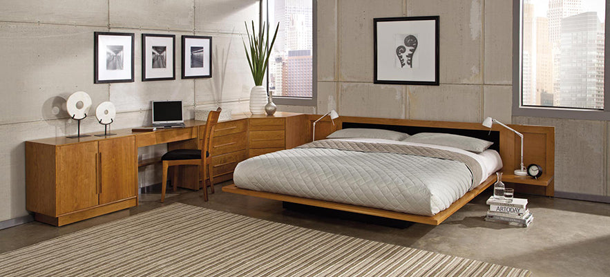 Contemporary wooden bedroom set featuring a sleek bed, matching desk, and dresser in minimalist design.