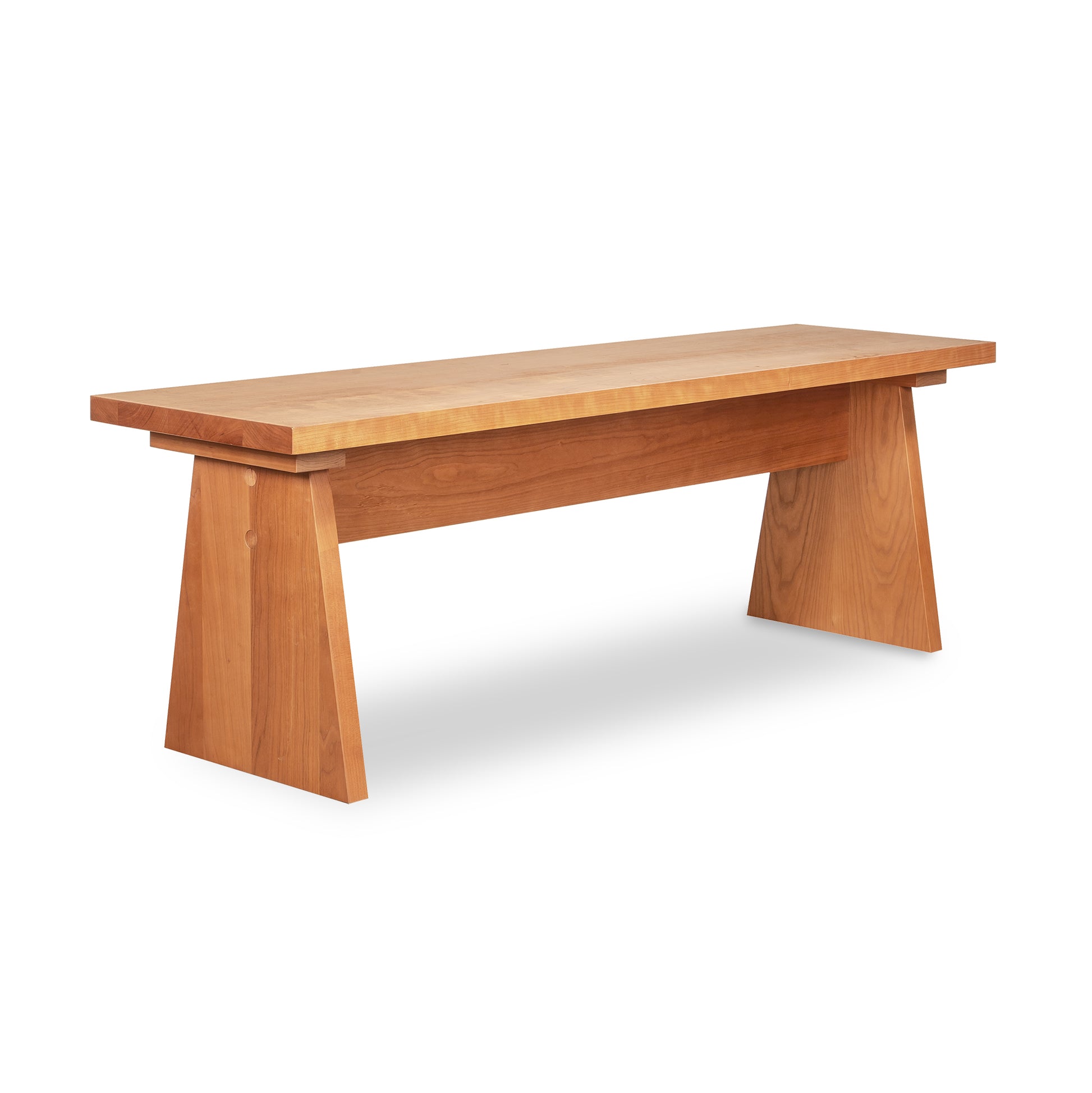 Lyndon Furniture Custom Modern Designer Bench with rectangular walnut top and angled legs, showcasing American craftsmanship and sleek modern style.