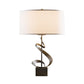 Hubbardton Forge Gallery Spiral Table Lamp with twisted bronze base and white cylinder shade, American made artisan lighting.