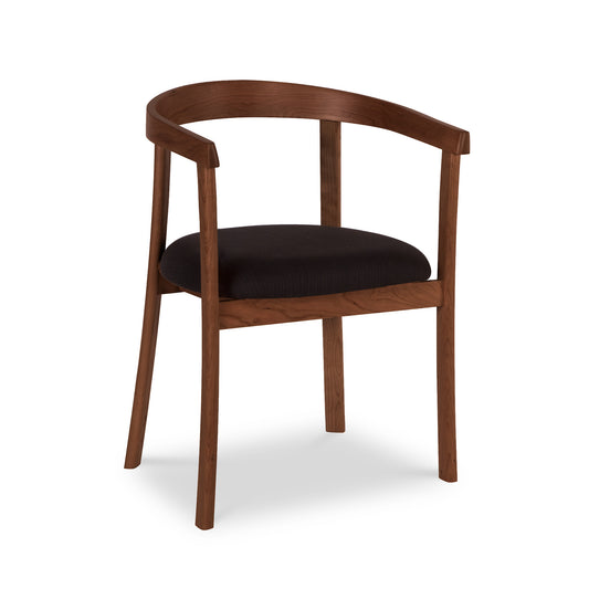 A Keeler Chair by Lyndon Furniture with a curved backrest and dark brown finish, featuring a black cushioned seat, reminiscent of mid-century modern furniture, isolated on a white background.