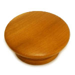 A round wooden knob on a white background.
