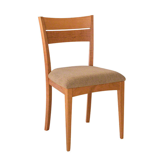 A Lowell Side Chair with Barley Upholstery by Lyndon Furniture, with a straight back and a beige upholstered seat, set against a plain white background. The wood appears smooth and gives the piece an elegant aspect.