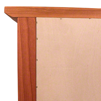 A piece of wood with a hole in it.