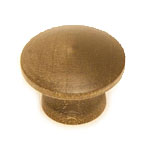 A round brass knob on a white background.