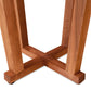 Detail view of Cherry & Walnut Artisan End Table legs by Mike Messer, showcasing the handcrafted intersecting X-shaped wood base.