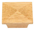 A square wooden knob on a white background.