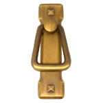 A brass door handle with a square handle.