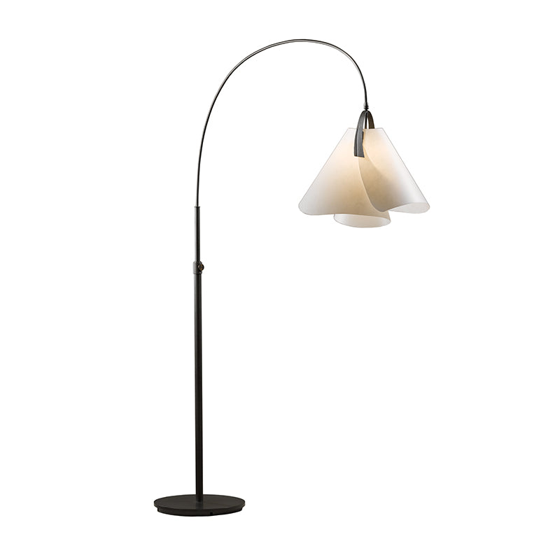 Hubbardton Forge Mobius Arc Floor Lamp with elegant curved black stand and double-layered white shade, showcasing modern craftsmanship.