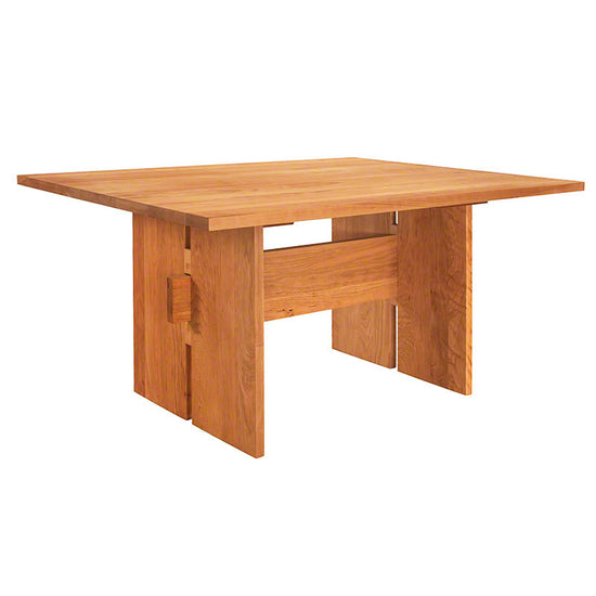 A square wooden table with two legs.