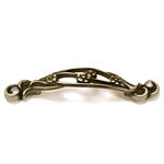 A metal handle with a floral design on it.