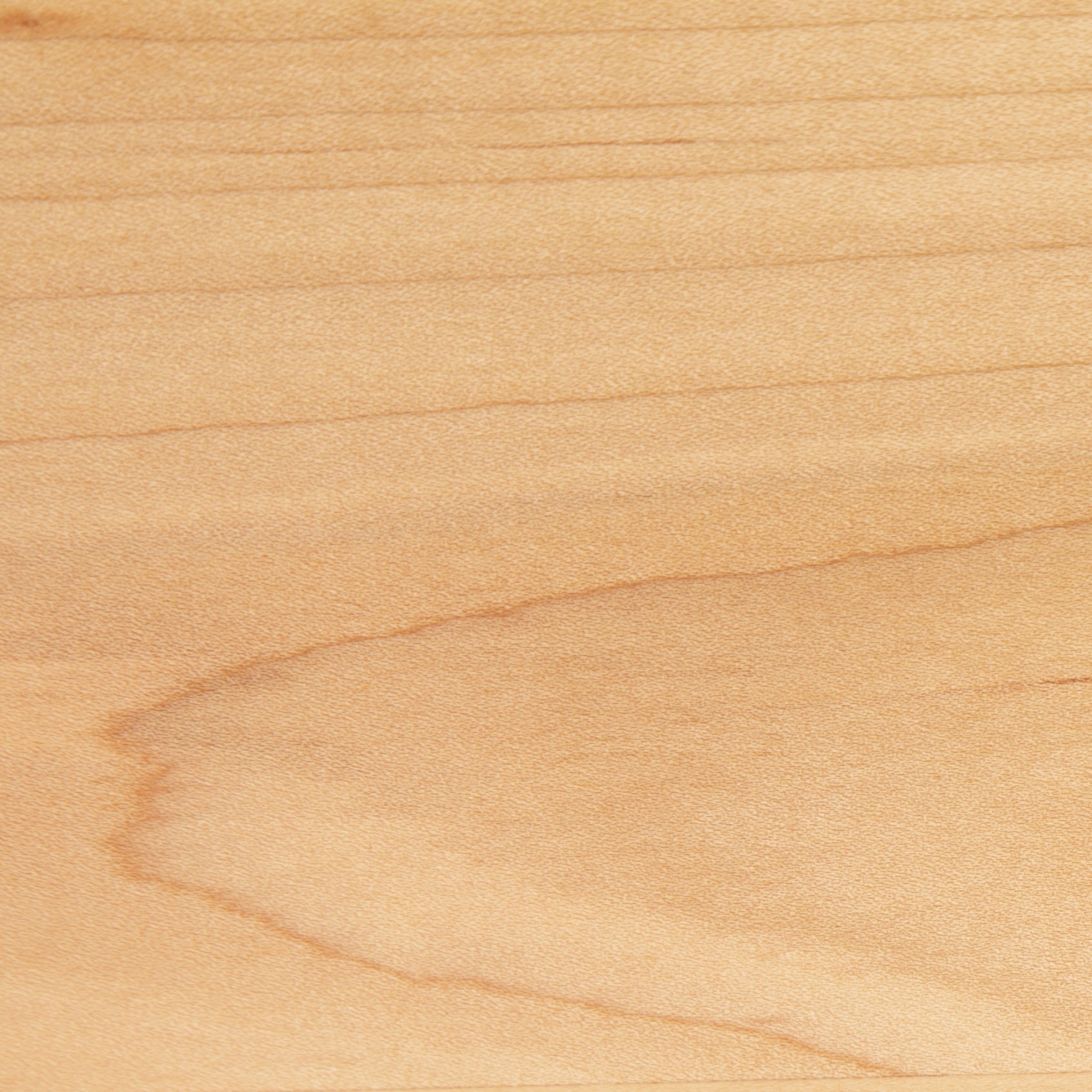 A close up of a wooden surface.