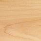 A close up of a wooden surface.