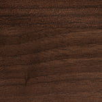 A close up view of a dark brown wood surface.