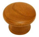 A round wooden knob on a white background.