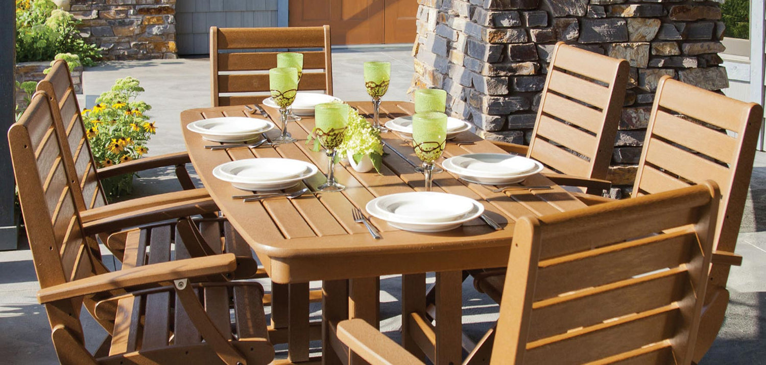 A wooden outdoor dining set with a table and chairs.