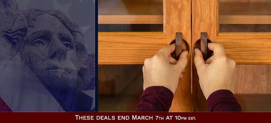 A person's hands are opening a wooden cabinet with glass doors. A partial image of Mount Rushmore is visible on the left side. Text at the bottom reads, "These deals end March 7th at 10pm EST.