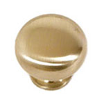A round brass knob on a white background.