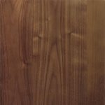 A close up image of a brown wood surface.