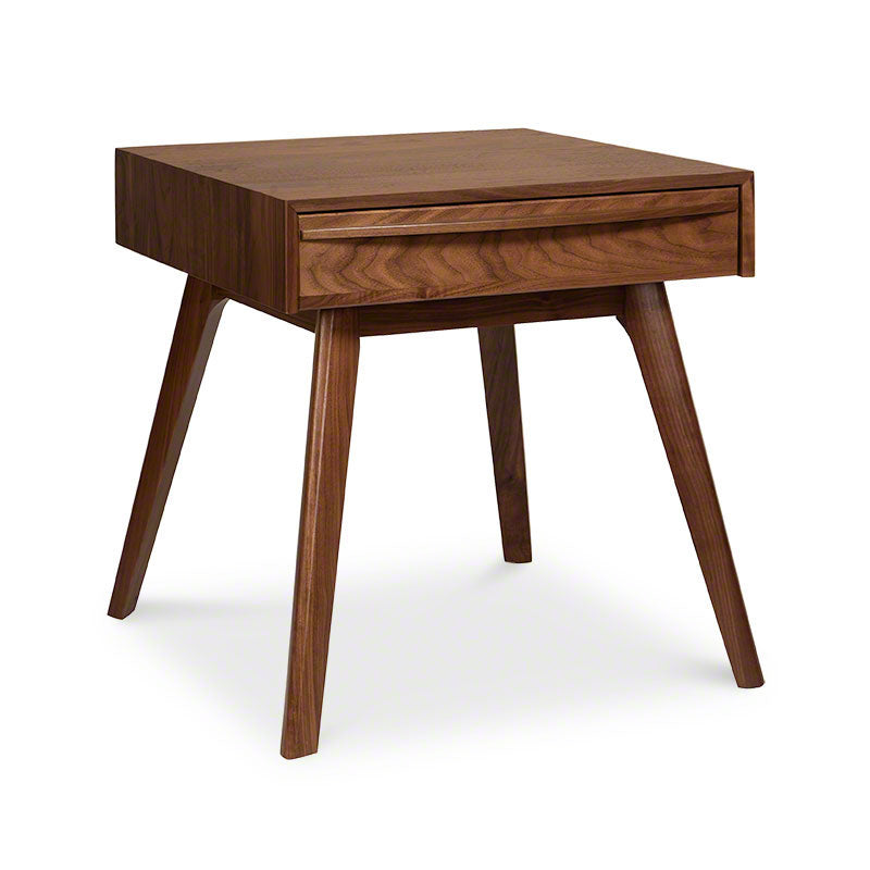 An end table with a drawer and wooden legs.