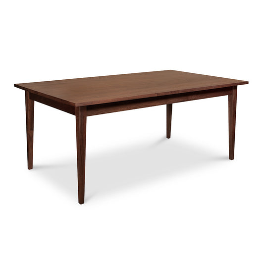 A dining table with a wooden top and legs.
