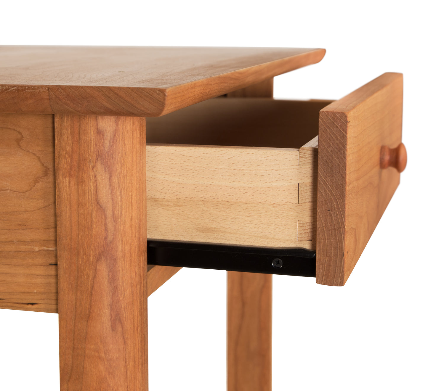 A wooden table with a drawer.