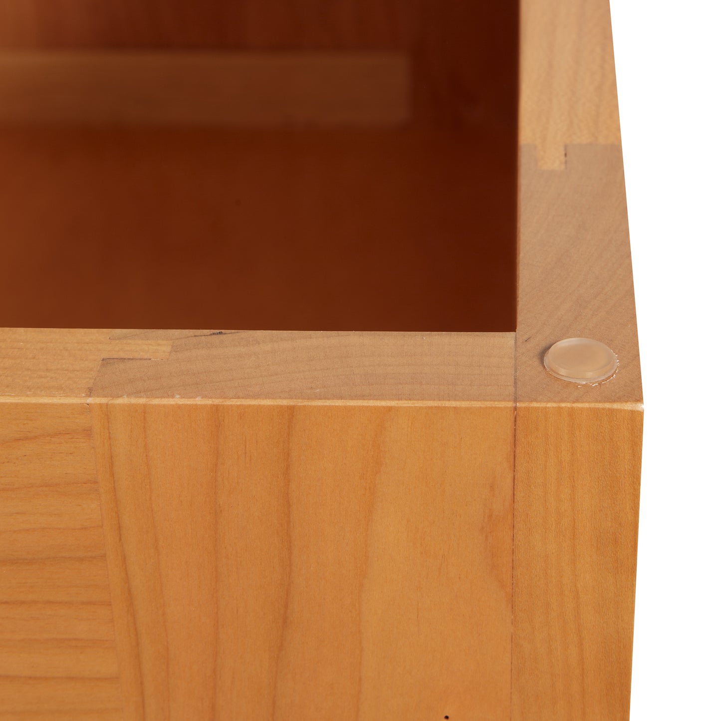 A close up of a wooden box on a white background.