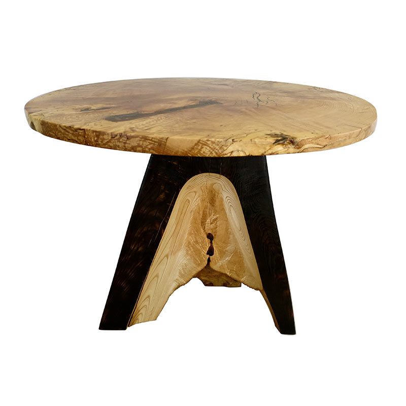 A round table with a black base and a wooden top.