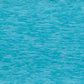 A blue background with a small amount of water on it.