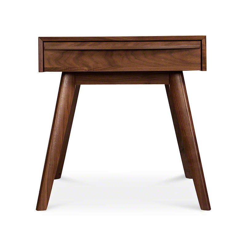 A modern nightstand with a drawer and wooden legs.