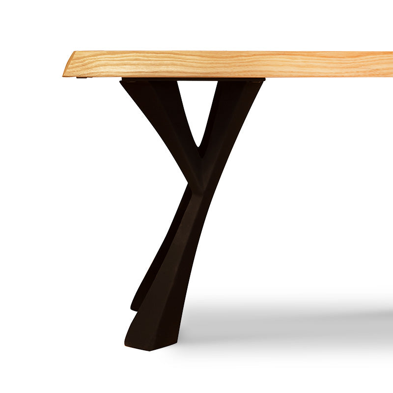 A table with a black base and a wooden top.