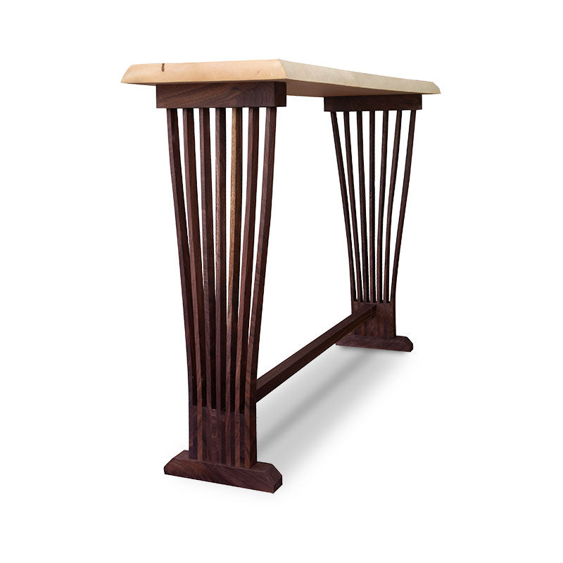 A console table with wooden legs and a wooden top.