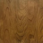 A close up image of Copeland Wood Samples, a product by Copeland Furniture, showcasing a wooden surface.