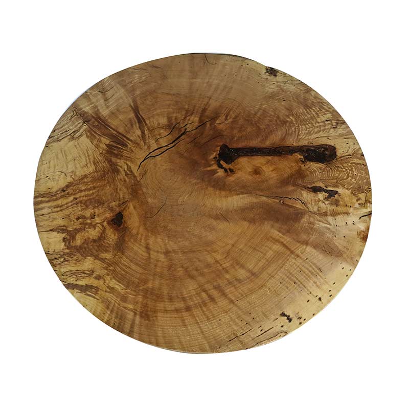 A circular piece of wood on a white background.