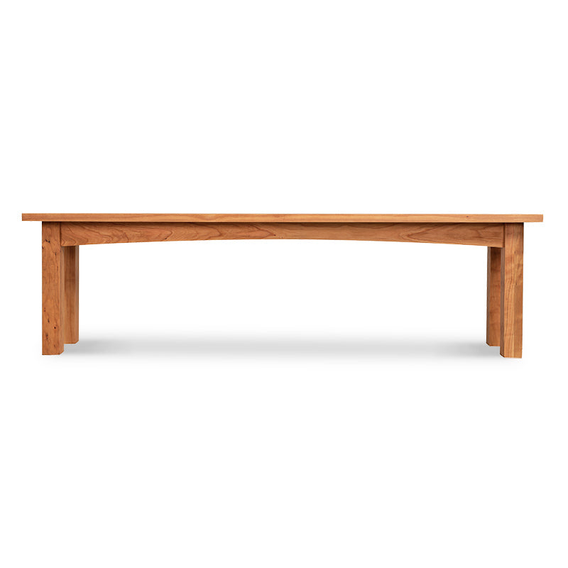 A wooden bench on a white background.